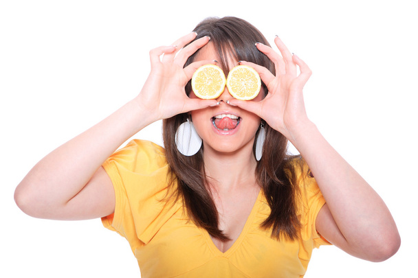 A pretty young woman with lemon - Photo, Image