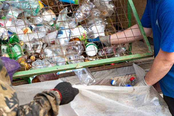 Chelyabinsk region, Russia - June 2019. Small business. Collection of household plastic for recycling. A pile of waste plastic bottles. - Zdjęcie, obraz