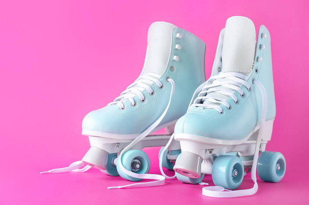 Vintage roller skates on color background - Photo, Image