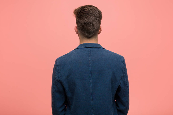 Young business natural man from behind, looking back. - 写真・画像