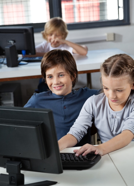 Little Boy And Girl Using Desktop Pc In Computer Lab - Photo, image