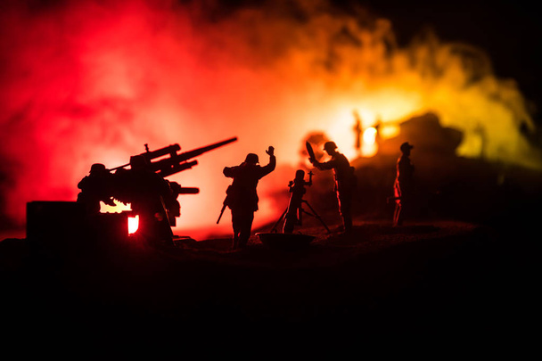 War Concept. Military silhouettes fighting scene on war fog sky background, - 写真・画像