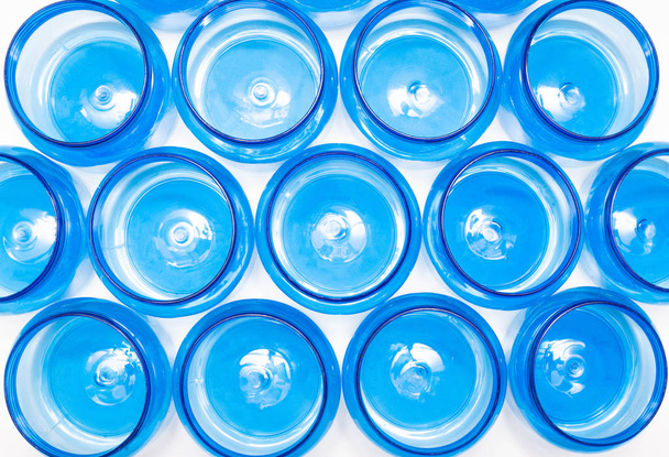 Blue plastic jars on a white background isolate, polyethylene terephthalate, tara, background - Foto, immagini