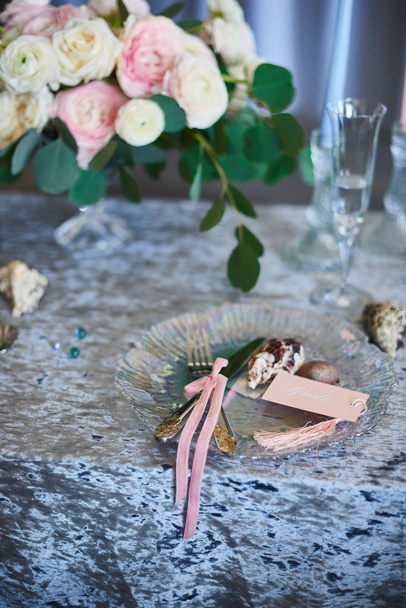 Festive table decor. Golden cutlery. With different natural colors and flowers. Garnet. Luxury wedding, party, birthday. View from above. Blue, grey, pink. Candles - Photo, Image