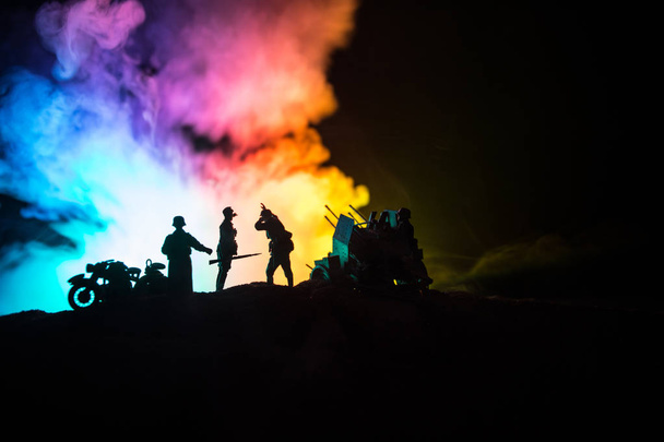 War Concept. Military silhouettes fighting scene on war fog sky background, - Φωτογραφία, εικόνα