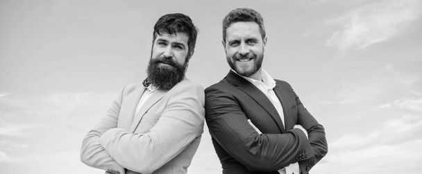 Perfect in every detail. Business people concept. Bearded business people posing confidently. Business men stand blue sky background. Well groomed appearance improves business reputation entrepreneur - Valokuva, kuva