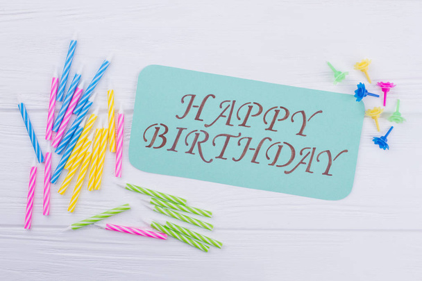 Birthday composition on white wooden background. - Photo, Image