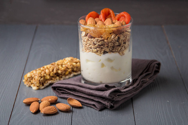 Homemade yogurt with granola, dried fruit and nuts bio with most healthy seed. - Zdjęcie, obraz