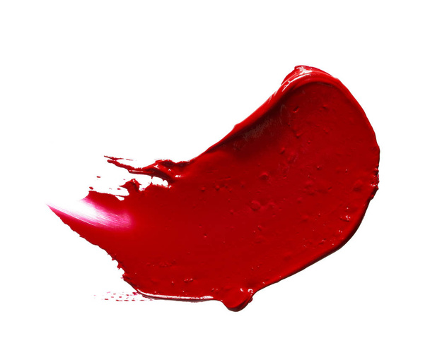 Red lipstick or acrylic paint isolated on white - Фото, зображення