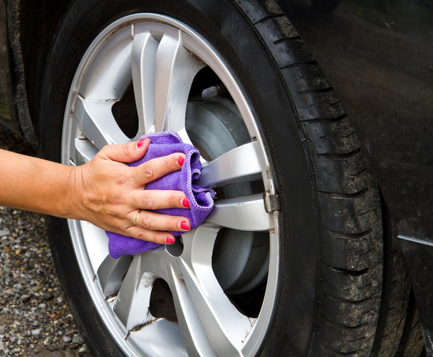 Outdoor tire car wash with sponge - Foto, Imagen