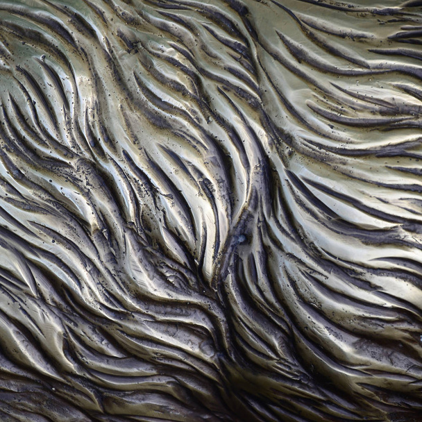 Детали и декоративный барельефный орнамент из металла кованых железных ворот в качестве фоновой текстуры
 - Фото, изображение