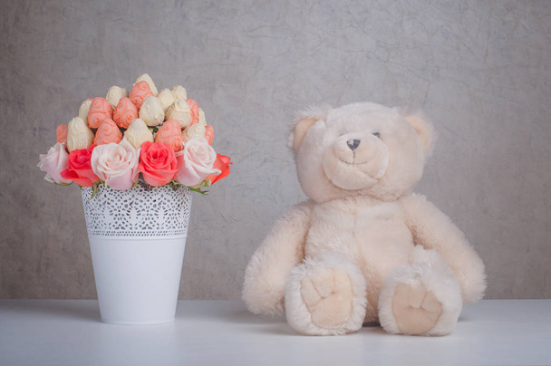 Fruit bouquet decoration with teddy bear toy on the table - Valokuva, kuva