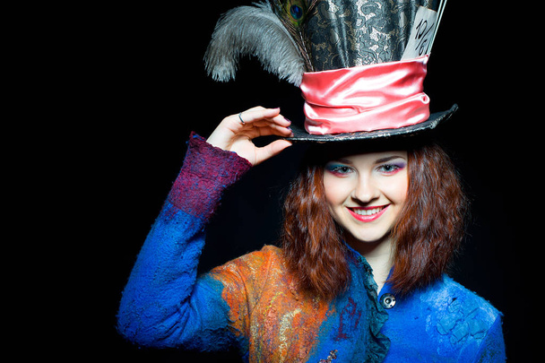 Portrait of smilimg young woman in the similitude of the Hatter - Photo, image