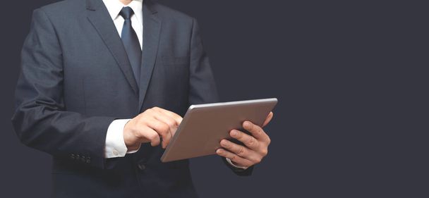 Man with digital tablet in hand. Copy space banner - Foto, imagen