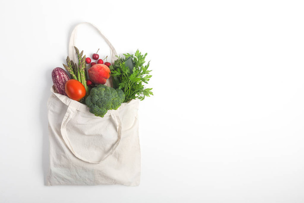 Reusable zero waste textile product bag, top view on white background - Fotografie, Obrázek