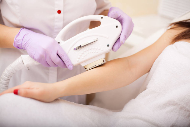 Skin care. Hands Laser epilation and cosmetology. Hair removal cosmetology procedure - Фото, зображення