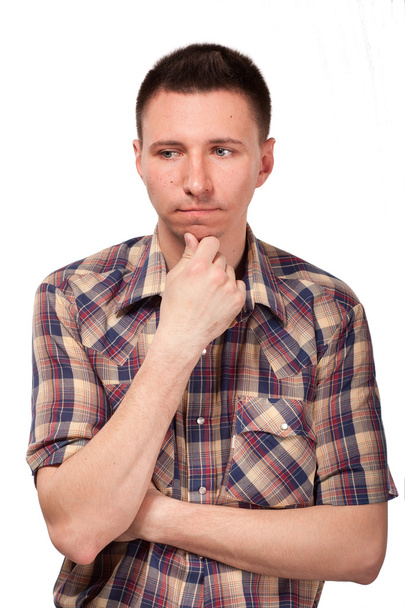 Pensive man in plaid shirt - Foto, afbeelding
