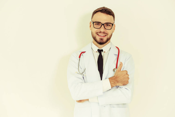 Doctor showing thumbs up on white background. - Photo, Image