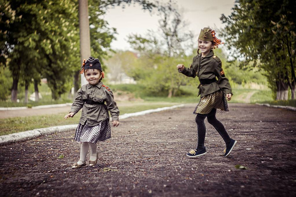 Two little girls in the park - Photo, Image