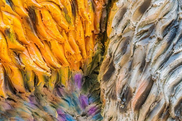 Цветные и узорчатые поверхности моделей динозавров созданы из цемента - Фото, изображение