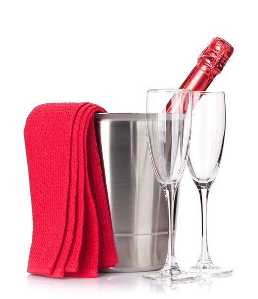 Champagne bottle in ice bucket and glasses - Photo, Image