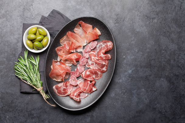 Spanish jamon, prosciutto crudo ham, italian salami - Zdjęcie, obraz