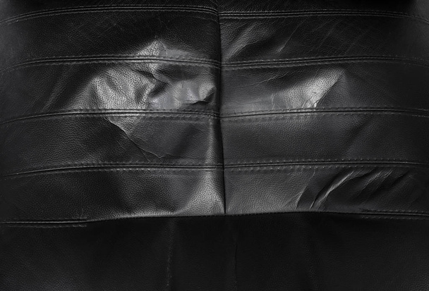 Black torn leather texture - Photo, Image