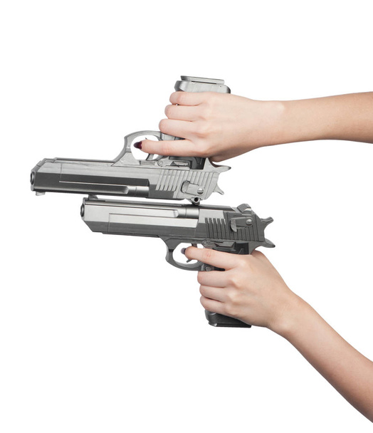 Double pistols in female hand - Фото, изображение