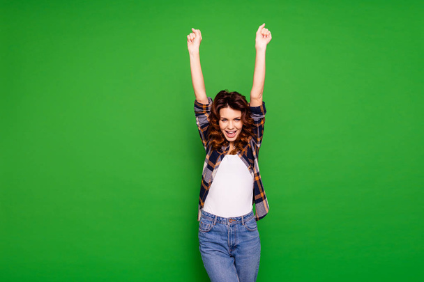 Portrait charming cute funny funky person  people thrilled shout yeah celebrate fan fun aim victory raise fists hands arms dream dreamy wear plaid fashionable shirt isolated vivid background - Foto, imagen
