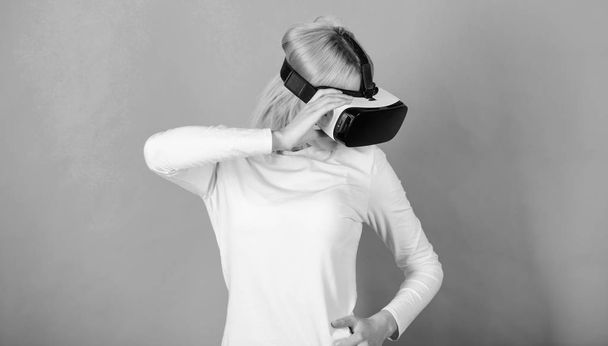 The woman with glasses of virtual reality. Woman with virtual reality headset. Funny woman experiencing 3D gadget technology - close up. Woman in VR. - Photo, Image