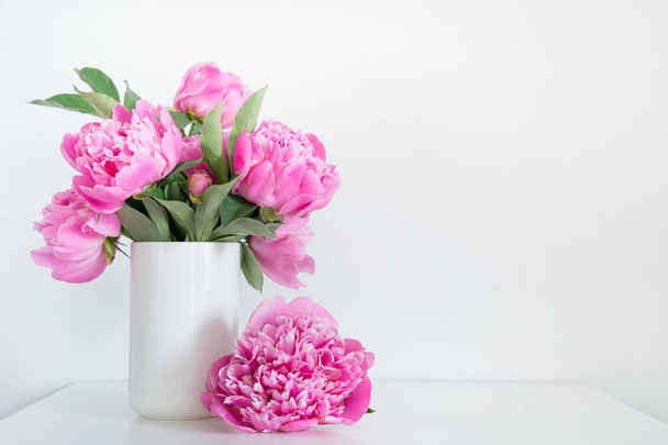 Bouquet of pink peony in vase for text on white. Mothers day. - Foto, Bild
