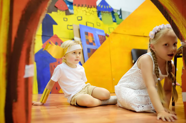 Moscow, Russia - 25 May , 2019: Little kids having fun on drama class or theatre Studio. Children playing greek heroes. - Фото, зображення