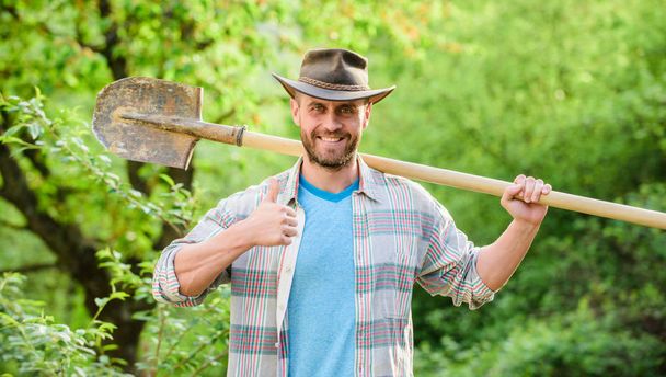 Eco farm. Harvest. sexy farmer hold shovel. farming and agriculture cultivation. Garden equipment. happy earth day. Eco living. muscular ranch man in cowboy hat. Gardener at work - Photo, Image