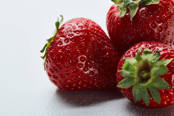 close up of red sweet strawberries on white background - 写真・画像