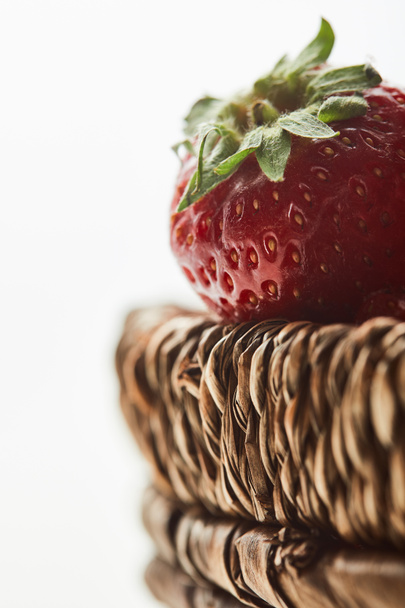 fresh red strawberries in wicker basket isolated on white - Foto, Imagen
