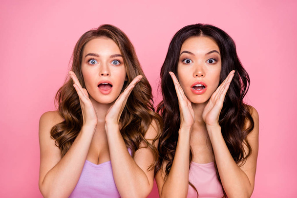 Portrait disappointed frustrated ladies millennial scream shout astonished impressed horrible news novelty wavy curly long hairdo beautiful trendy modern youth clothing isolated upset pink background - 写真・画像