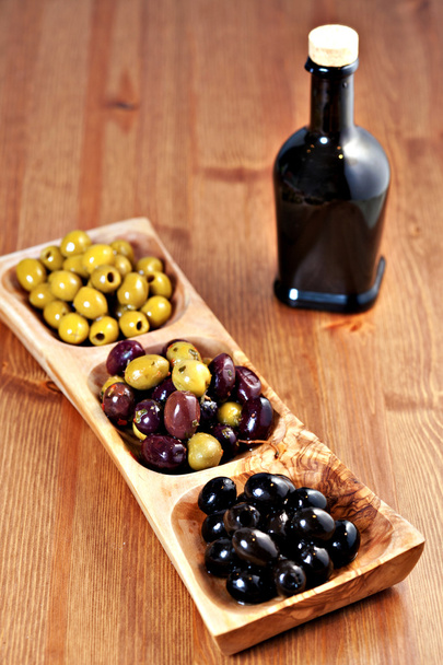 Variety of green, black and mixed marinated olives - Foto, immagini