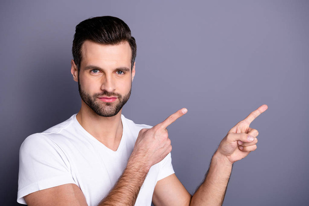 Close up photo amazing he him his macho perfect ideal appearance neat bristle index fingers indicating empty space novelty advising buy buyer wear casual white t-shirt isolated grey background - Φωτογραφία, εικόνα