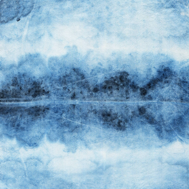 Tie-dye pattern of indigo color on white silk. Hand painting fabrics - nodular batik. Shibori dyeing.  - Photo, Image