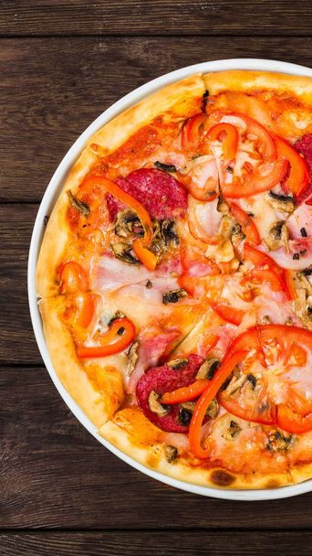 Delicious pizza with mushrooms and smoked chicken - Photo, Image