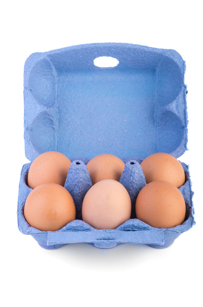 Schachtel mit sechs braunen Eiern - Foto, Bild
