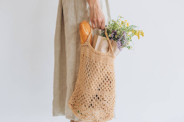 woman shopping eko style string bag vegetables - Fotó, kép