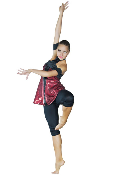 Young dancer dances in a red dress - Foto, Imagen