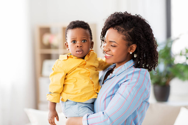 happy african american mother with baby at home - Photo, Image