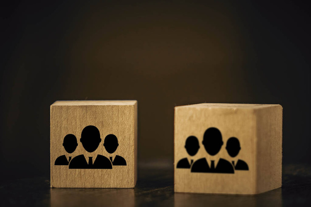 wooden cubes image of staff on a black background - Photo, Image