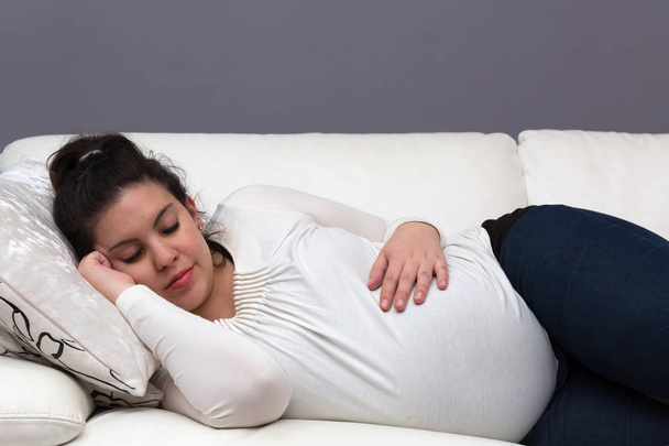 Tired Expectant Mom Sleeping on the Couch - Foto, Imagem