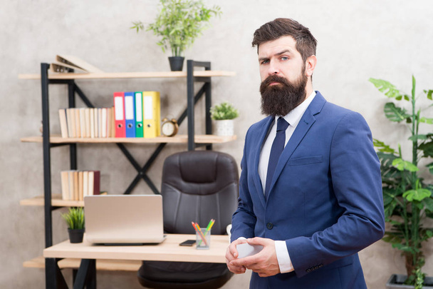 Bearded hipster top manager hold card. Banking services. Guy formal suit stand in office. Businessman hold blank card. Finance and accounting. Easy and quick payment. Bank card. Financial support - Foto, Imagem
