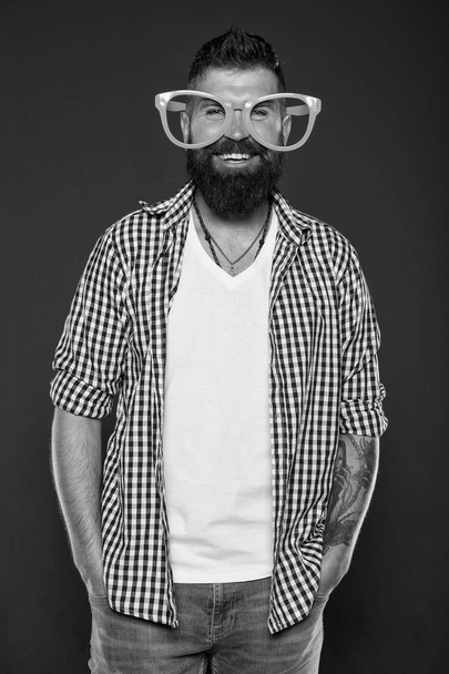 Stay positive. Man brutal bearded hipster wear funny eyeglasses accessory. Human strengths and virtues. Positive mood. Positive psychology. Overcome life troubles with smile. Happiness and positive - Fotografie, Obrázek