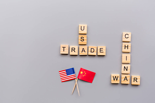 Creative top view flat lay of China and USA flags and cash money, mockup and copy space on gray background in minimal style. Concept of trade war between USA and China - Fotoğraf, Görsel