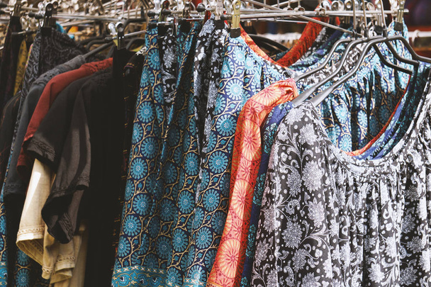 clothes rack with boho hippie style womens fashion - Fotoğraf, Görsel